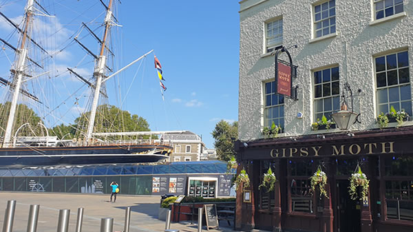 Gypsy Moth pub with the Cutty Sark in the background